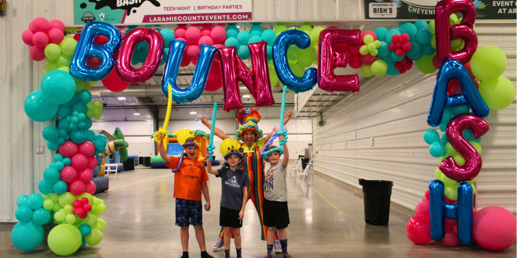 Kids excited to jump and bounce on the indoor inflatable playground inside the Event Center at Archer during WYO Bounce Bash in Cheyenne Wyoming.